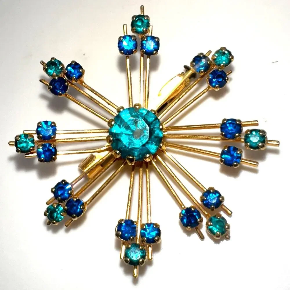 Vintage 1950s gold tone blue teal rhinestones starburst Sputnik brooch